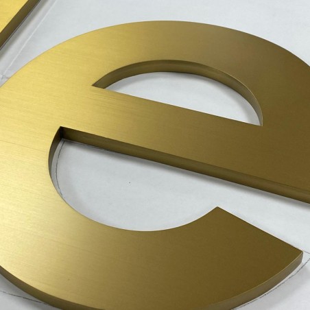 Lettres boitier rétroéclairées laiton brossé doré - Enseigne LED élégante